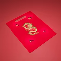 Red Gift Bag With Golden Dragon Design And Small Decorative Elements