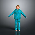 Man In Blue Pajamas Standing With Arms Outstretched On Gray Background