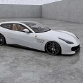 White Ferrari Two Door Car With Sleek Body And Black Wheels In Modern Indoor Space