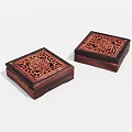 Two Square Wooden Boxes With Intricate Carved Patterns On Dark Brown Surface 3d model