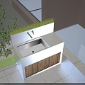 Outdoor washbasin with stone countertop faucet and wooden cabinet near green plants on tiled floor