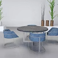 Modern Gray Lounge Chairs With Round Tables Green Plants And White Shelves In Indoor Setting