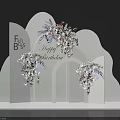 Elegant Floral Display With White Cloud Structure Purple White Flowers And Birthday Theme