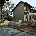 Traditional Guesthouse Building With Wooden Walkway Stone Pavement And Outdoor Seating