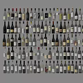 Variety of Stylish Wine Bottles and Glasses Neatly Arranged in Wall