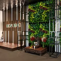 Bright Restaurant Interior With Wooden Tables Chairs Black Ceiling Woven Pendant Lights Green Plant Wall And Large Windows