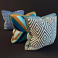 Vibrant Geometric Throw Pillows Featuring Diamond Shapes And Striped Patterns