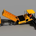 Yellow Dump Truck and Paver Working Together on Industrial Construction Site