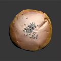 Golden Brown Bun Topped With Black Sesame Seeds On Black Background With Reflection