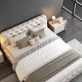 Luxurious Tufted White Bed With Dark Wall Vertical Light Bedside Tables Water View Soft Rug