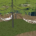 Outdoor Hammock Setup Between Trees With Grass Wooden Deck And People Relaxing