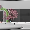 Decorative Floral Installation With Green Frame And Pink Elements In Multi Level Exhibition Space