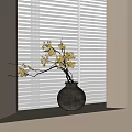 Gray Ceramic Vase With Yellow Flowers And Branches On Windowsill Against White Blinds