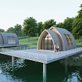 Arched Roof Guesthouse Buildings On Overwater Platform With Surrounding Trees And People Walking