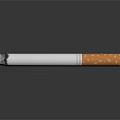 Isolated Burned Cigarette With White Body Orange Filter On Dark Background