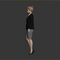 A Woman In Black Blazer White Shirt Gray Skirt Black High Heels Against Gray Background