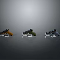 Three Different Colored Pistols Displayed On Black Background With Reflective Surfaces