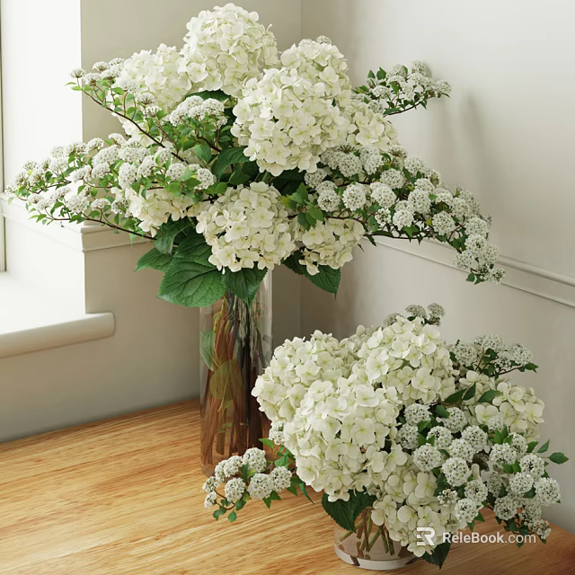 White Hydrangea Flowers Arranged in Clear Glass Vase on Wooden Floor with Fresh Green Leaves 3d model 