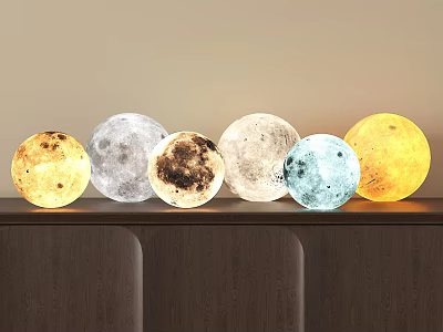 Moon Shaped Floor Lamps With Various Colors And Textured Surfaces On Wooden Cabinet 3d model