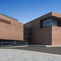 Modern Brick Office Building with Geometric Structure White Roof And Large Glass Windows