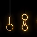Modern Pendant Lights With Different Ring Designs And Warm Glow On Black Background