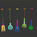 Multiple Colorful Hanging Decorative Objects With Yellow Tops Black Strings And Transparent Parts