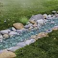 Tranquil Garden Landscape Featuring Natural Stream Stones Lush Green Grass And Plants