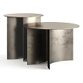 Two Round Metal Coffee Tables With Modern Textured Surface And Stacked Design 3d model