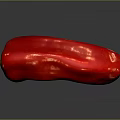 Fresh Red Chili Pepper With Green Inner Flesh On Dark Reflective Surface