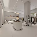Modern Minimalist Clothing Store Interior With White Display Shelves Clothing Racks And Sofa