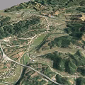 Aerial Planning of Mountainous Terrain With Rolling Hills Green Vegetation and Paths