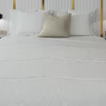 Modern Hotel Room Interior With Comfortable Bed Nightstand Armchair And Geometric Rug
