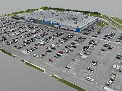 Aerial View of Large Retail Store Parking Lot Full of Cars and Green Surroundings 3d model