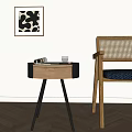 Stylish Round Wooden Console Table with Black Frame and Decorative Items Next to Rattan Chair