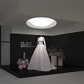 Elegant Bridal Shop Interior With White Decor And Wedding Gown Displays