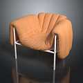 Orange Pleated Single Sofa With White Metal Legs And Modern Design