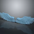 Blue Symmetric Wings of Mythical Creature With Reflective Surface and Sculptural Design