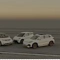Three White Electric Vehicles Parked On Open Ground With Scenic Background