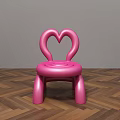 Pink Kids Chair With Heart Shaped Backrest And Rounded Design On Wooden Floor