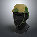 Yellow Helmet With Green Straps Displayed On Black Mannequin Head