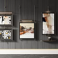 Modern Wall Art Decor With Framed Paintings On Black Background And Small Shelf Holding Vase