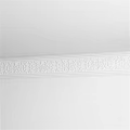 Decorative Sculptural Carvings On White Wall With Intricate Floral Patterns