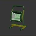 Portable Work Light Floodlight with Orange Black Frame Handle and Wheels for Outdoor Use