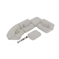 Modern Modular Sectional Sofa With Neutral Blush Tones Throw Pillows And Ottoman