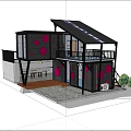 Two Story Container Building With Red Containers Yellow Circles And Outdoor Deck Surrounded By Trees
