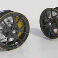 Sleek Black Alloy Car Wheels With Yellow Rim Accent And Silver Spokes
