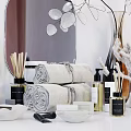 Elegant Bathroom Accessories with Soft Towels Aromatic Candles Decorative Mirrors Lotion Bottles and Decorative Branches
