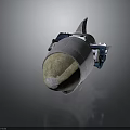 Silver Metallic Bomb Shaped Object Featuring Brown Tip Fins And Textured Surface