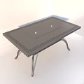 Sturdy Metal Outdoor Table With Ornate Legs And Flat Top Surface Design