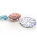 Three Hand Carved Sculptural Ceramic Bowls With Colorful Intricate Patterns And Designs